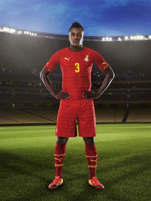 Asamoah Gyan in the 2014 Ghana Away Kit that features PUMA's PWR ACTV Technology