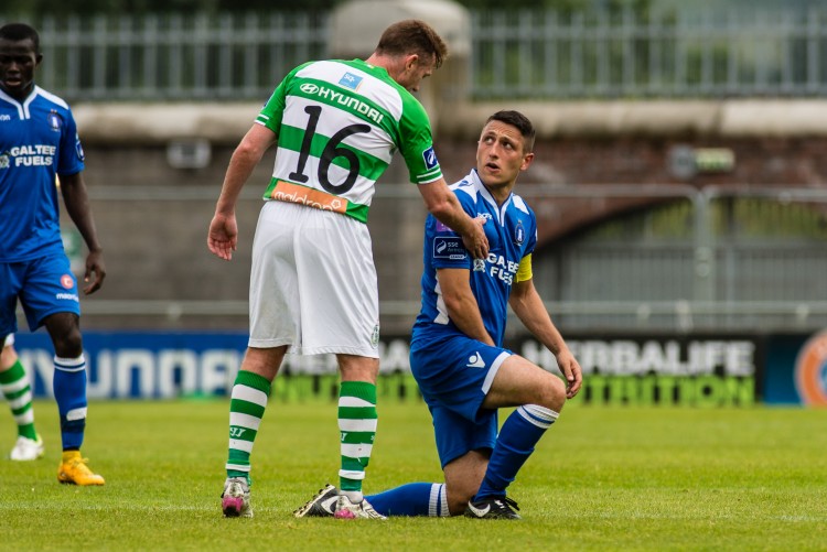 JULY 26: Pat Cregg of Shamrock Rovers apologies to Shane Duggan of Limerick FC after a tackle during the Shamrock Rovers v Limerick - SSE Airtricity League Premier Division (Photo by Tom Beary/phcimages.com)